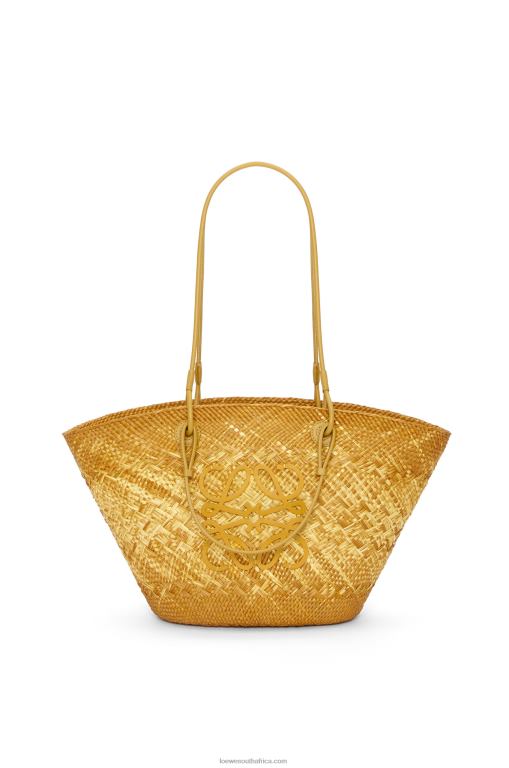 Loewe Women Anagram basket bag in iraca palm and calfskin 206XF7 Ochre
