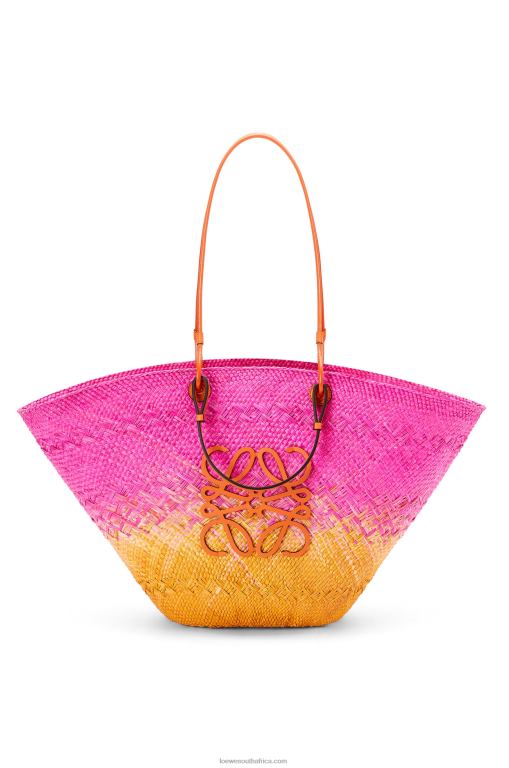 Loewe Women Large Anagram Basket bag in iraca palm and calfskin 206XF84 Fuchsia/Orange