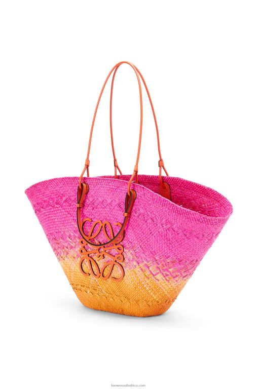 Loewe Women Large Anagram Basket bag in iraca palm and calfskin 206XF84 Fuchsia/Orange