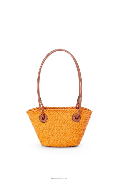 Loewe Women Mini Anagram Basket bag in iraca palm and calfskin 206XF97 Orange/Tan