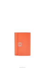 Loewe Women Anagram small vertical wallet in pebble grain calfskin 206XF1292 Orange